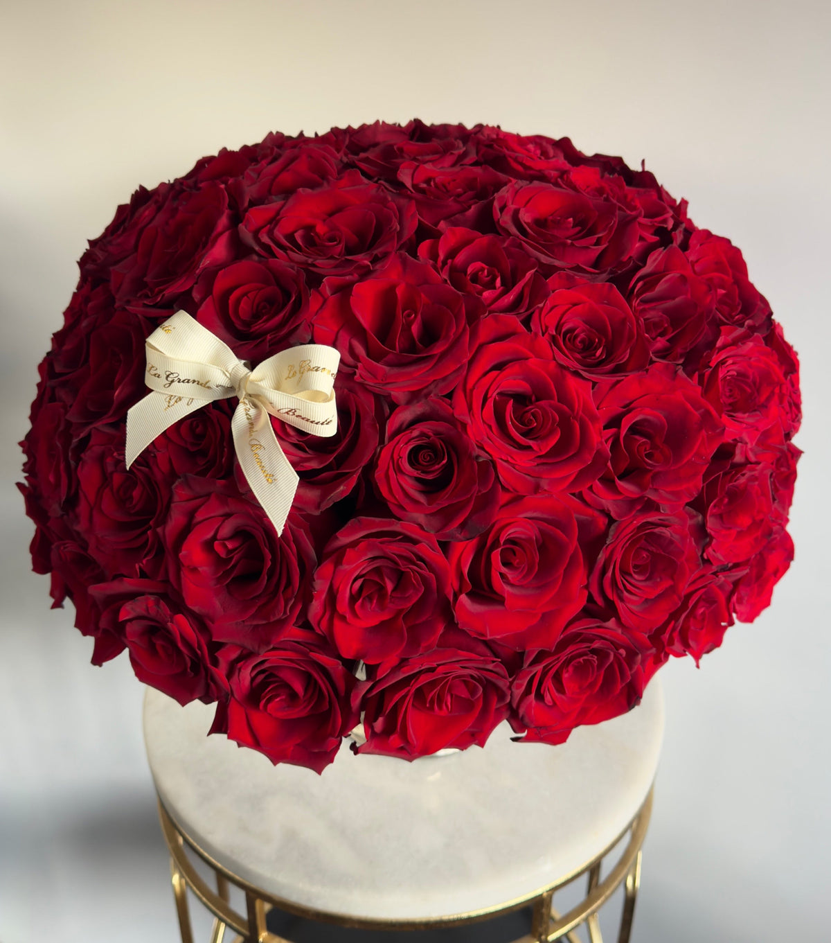 “Timeless Beauty” – dome of red roses in a silver vase by La Grande Beauté, luxury flower delivery London