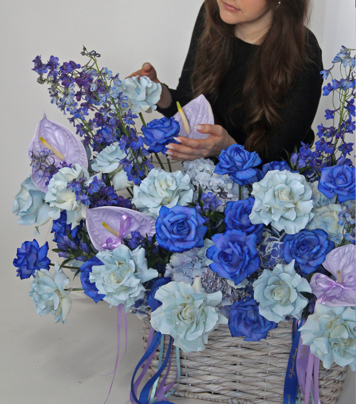 “Crown” – wicker basket of blue roses and hydrangea by La Grande Beauté, luxury flower delivery London