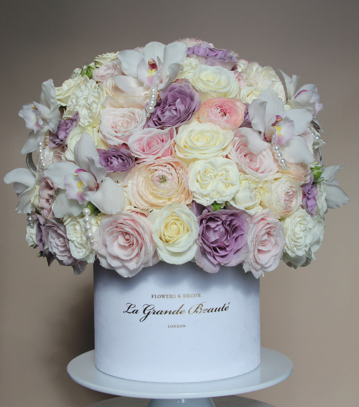 “Shimmer” – rose, ranunculus and pearl orchid velvet box by La Grande Beauté, luxury flower delivery London