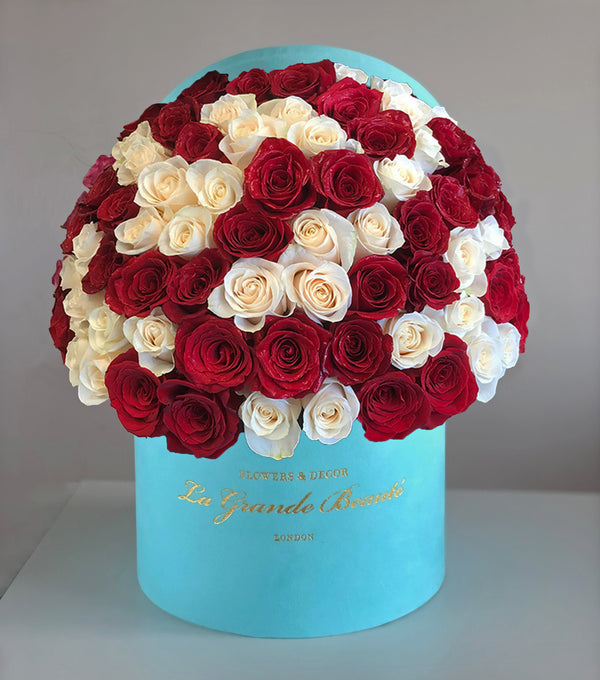 ''Cupid'', freshflowerbox, La Grande Beaute, Fresh, valentines, "Cupid" rose box is elegant, stylish and sophisticated. Capture the essence of romance and passion with this stunning box of classic red and white roses. The arrangement in the photo is 75 roses in the blue 25cm "La Grande Beaute" velvet box. Central London Delivery Only. Please check our shipping policies for postcodes. DISCLAIMER - FRESH FLOWERS: These are fresh cut flowers and are perishable.Please check "Care & Handling" for how