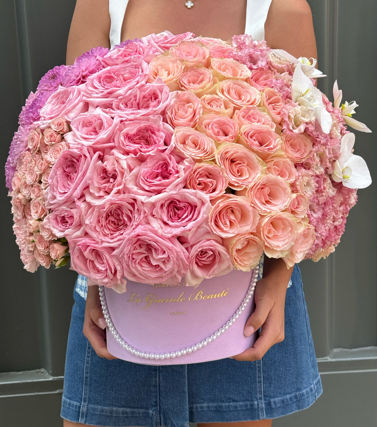 “Cherished” – pink roses, eustomas and orchids in a box by La Grande Beauté, luxury flower delivery London
