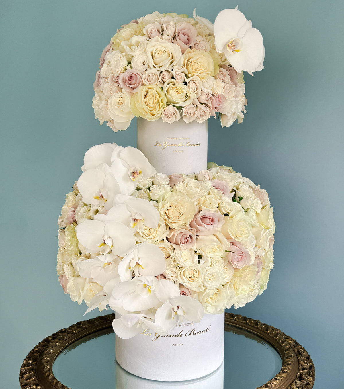 “Ivory Serenade” – two-tier white rose and orchid box by La Grande Beauté, luxury flower delivery London