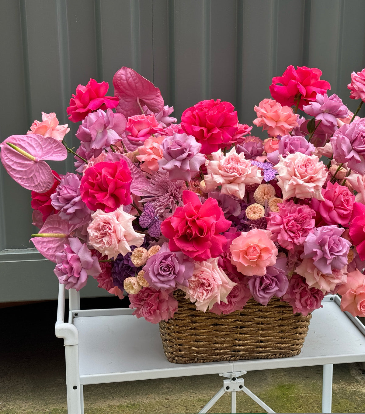 “Pink Magic” – basket of pink roses and anthuriums by La Grande Beauté, luxury flower delivery London