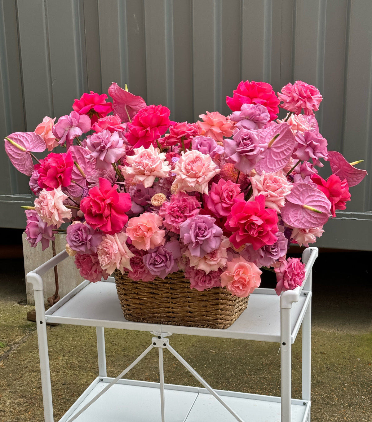 “Pink Magic” – basket of pink roses and anthuriums by La Grande Beauté, luxury flower delivery London