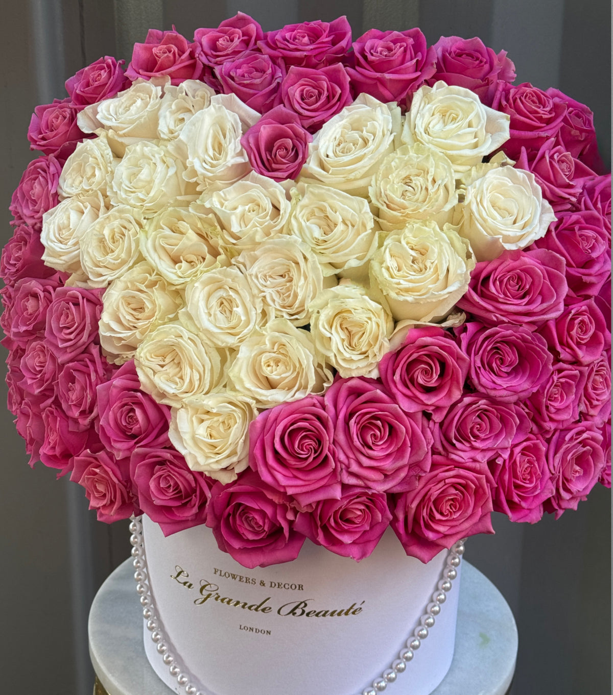 “Pure Affection” – heart box of pink and white roses by La Grande Beauté, luxury flower delivery London