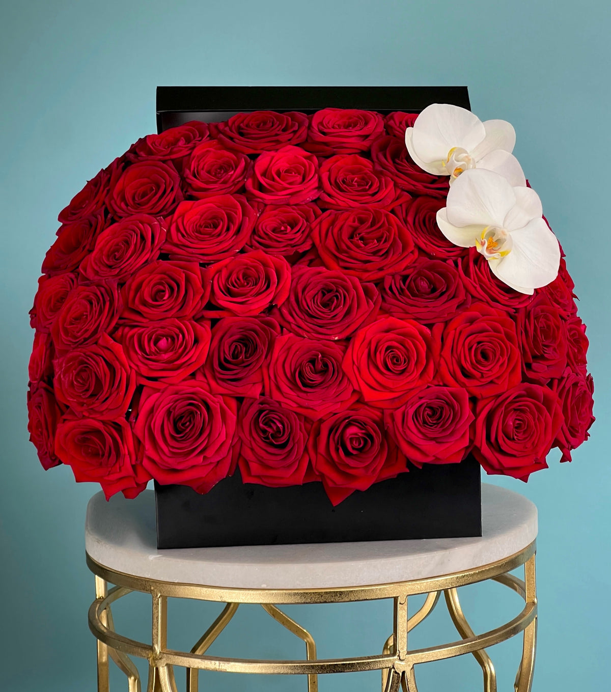 “Eros” – red roses in a 25cm black square box by La Grande Beauté, luxury flower delivery London