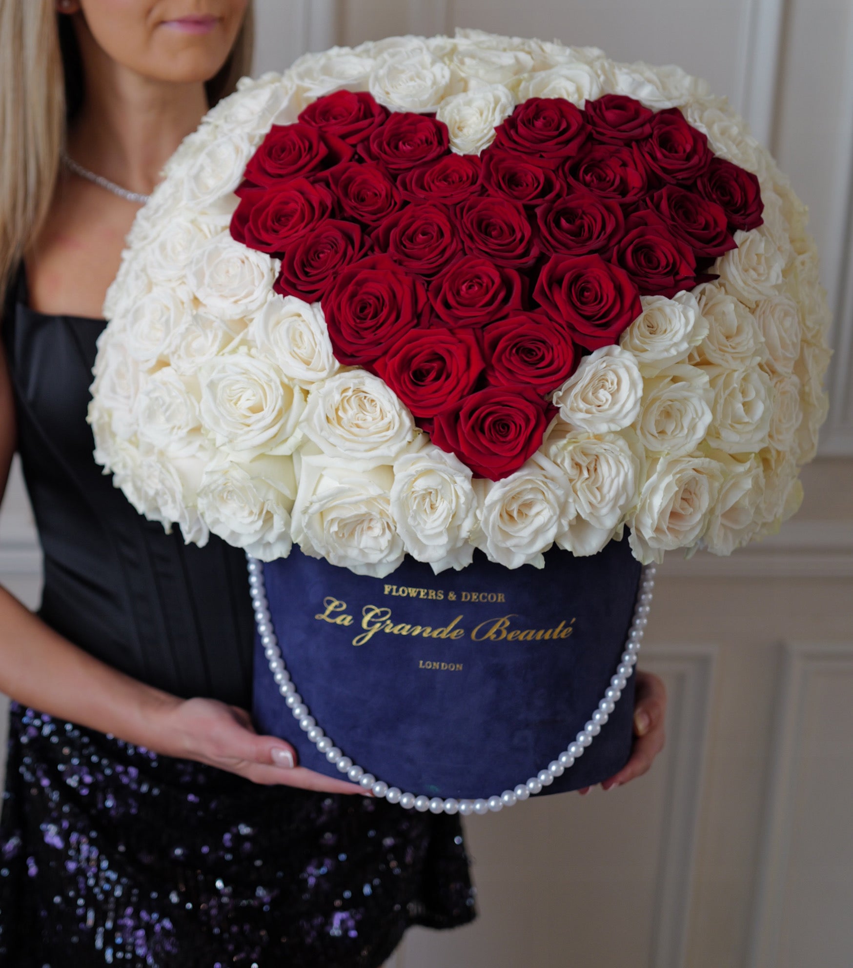 “La Grande Romance” – heart box of 100 red and white roses by La Grande Beauté, luxury flower delivery London