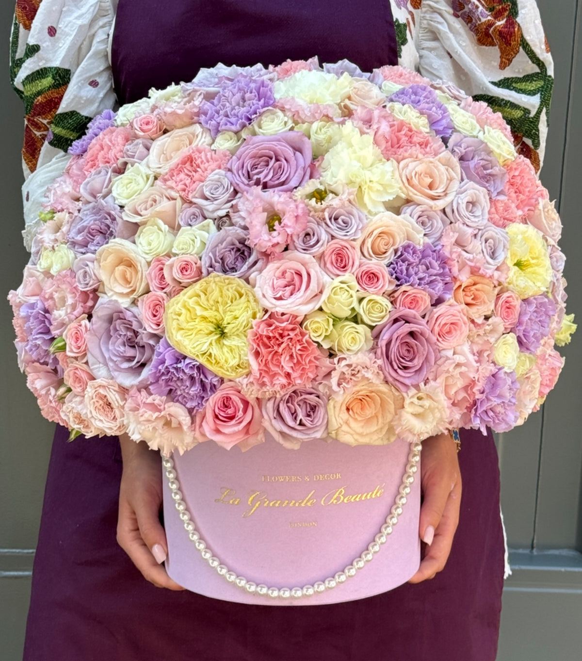 “Dazzle” – purple, pink and yellow flowers in a velvet box by La Grande Beauté, luxury flower delivery London