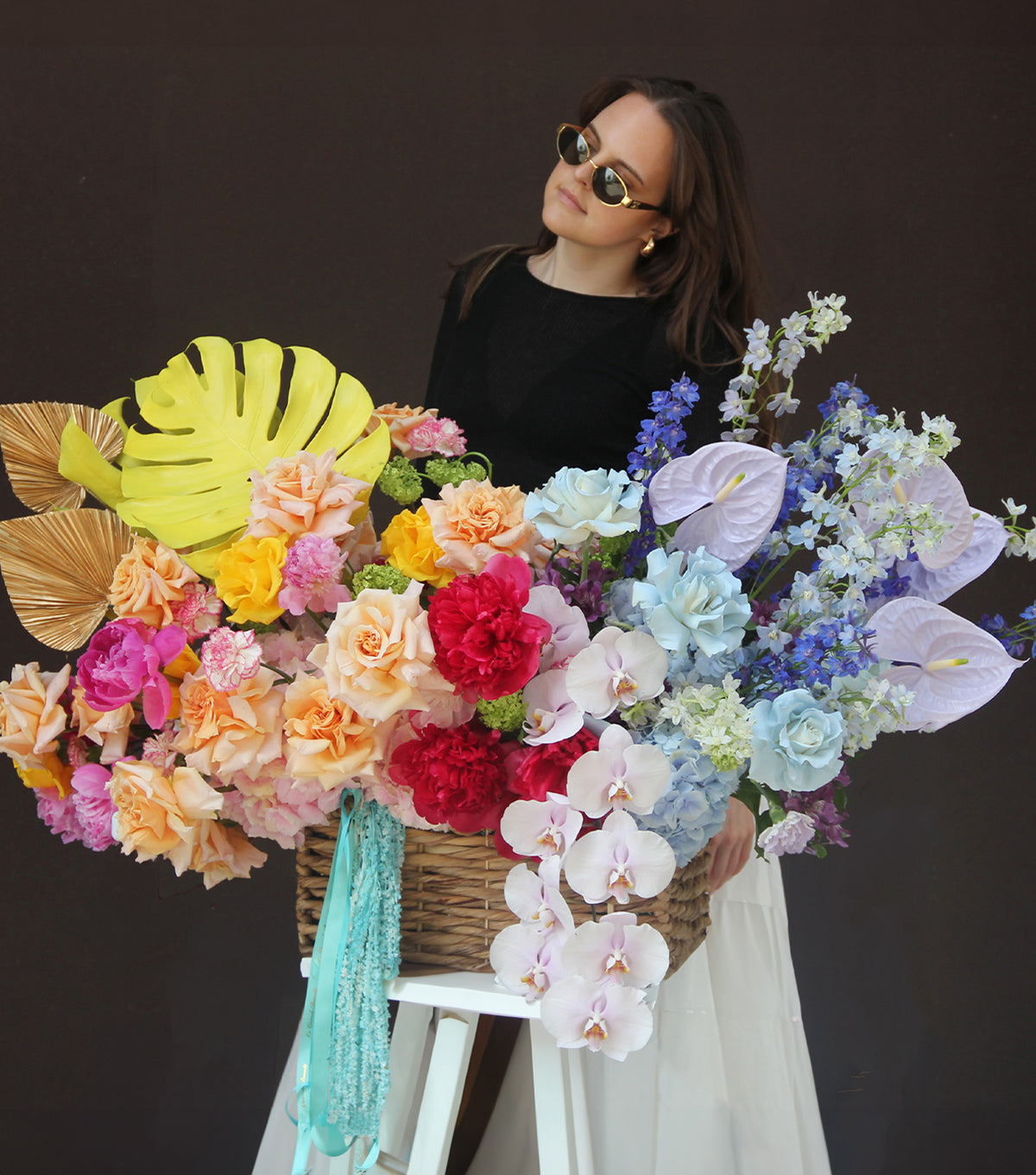 “In Paradise” – basket of bright roses and anthuriums by La Grande Beauté, luxury flower delivery London