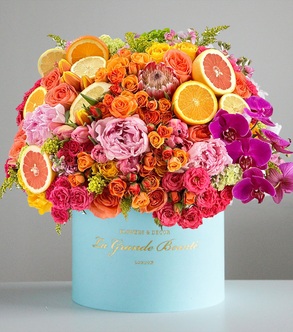 “Tropicana” – bright flower box with oranges by La Grande Beauté, luxury flower delivery London