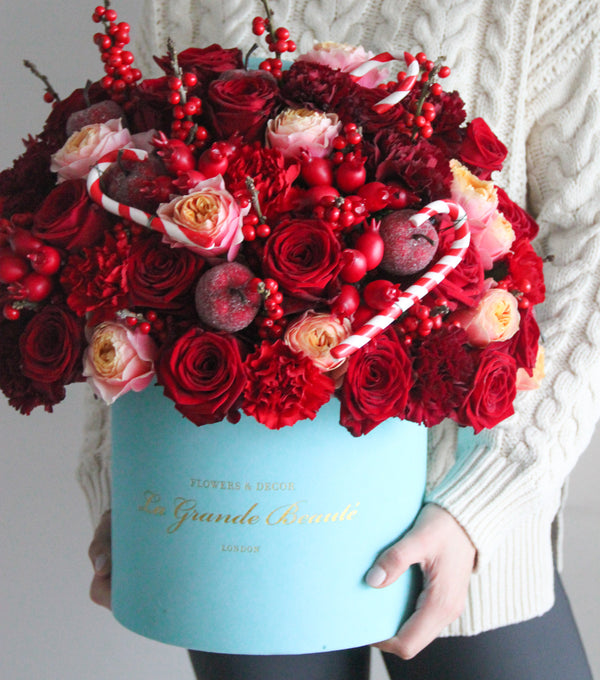 ''Christmas in a Box'', freshflowerbox, La Grande Beaute, christmas, Fresh, Welcome the charm of the season with '' Christmas in a Box''. Create a festive mood at your home or gift a Christmas Spirit to your loved ones. Garden roses, classic roses, carnations and berry branches are used to make this beautiful design. The arrangement in the photo is in the 25cm size La Grande Beaute velvet box. Central London Delivery Only. Please check our shipping policies for postcodes. DISCLAIMER - FRESH FLOW