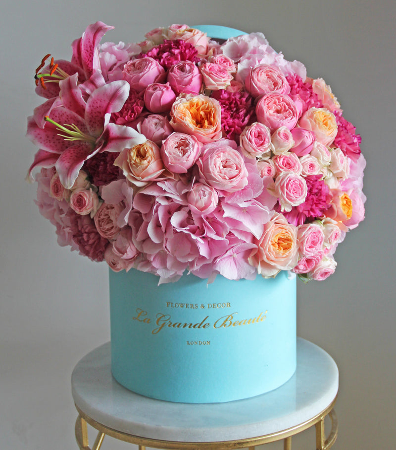 ''Duchess'', freshflowerbox, La Grande Beaute, Fresh, mother, valentines, Say it with flowers! Pink blush garden and spray roses, hydrangeas and lilies are used in this beauty to create a breathtaking flower box. The arrangement in the photo is in the blue 25cm size La Grande Beaute velvet box. Central London Delivery Only. Please check our shipping policies for postcodes. DISCLAIMER - FRESH FLOWERS: These are fresh cut flowers and are perishable.Please check "Care & Handling" for how to care fo