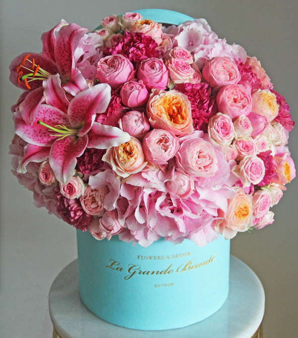 ''Duchess'', freshflowerbox, La Grande Beaute, Fresh, mother, valentines, Say it with flowers! Pink blush garden and spray roses, hydrangeas and lilies are used in this beauty to create a breathtaking flower box. The arrangement in the photo is in the blue 25cm size La Grande Beaute velvet box. Central London Delivery Only. Please check our shipping policies for postcodes. DISCLAIMER - FRESH FLOWERS: These are fresh cut flowers and are perishable.Please check "Care & Handling" for how to care fo