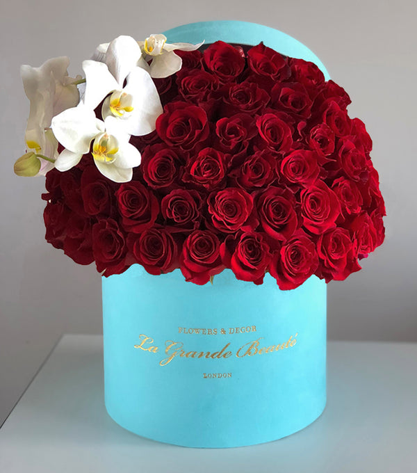 “Je T’aime”, freshflowerbox, La Grande Beaute, Fresh, valentines, "Je T'aime” rose box is elegant, stylish and sophisticated. Capture the essence of romance and passion with this stunning box of classic red roses. The arrangement in the photo is in the 25cm "La Grande Beaute" velvet box with 75 roses. Central London Delivery Only. Please check our shipping policies for postcodes. DISCLAIMER - FRESH FLOWERS: These are fresh cut flowers and are perishable.Please check "Care & Handling" for how to 